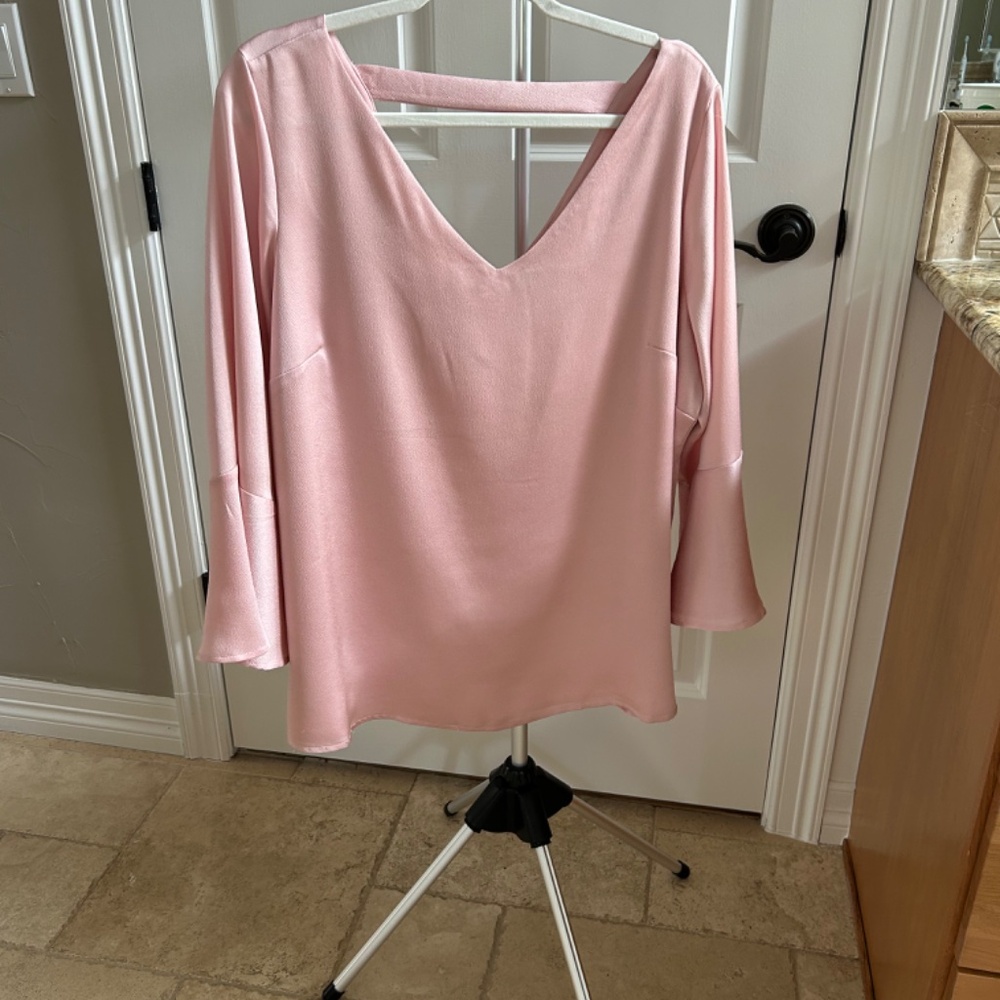 Roz & Ali pink top with bell sleeves.